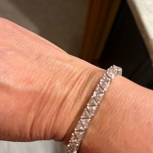 7 1/2 inch tennis bracelet. Light pink stones